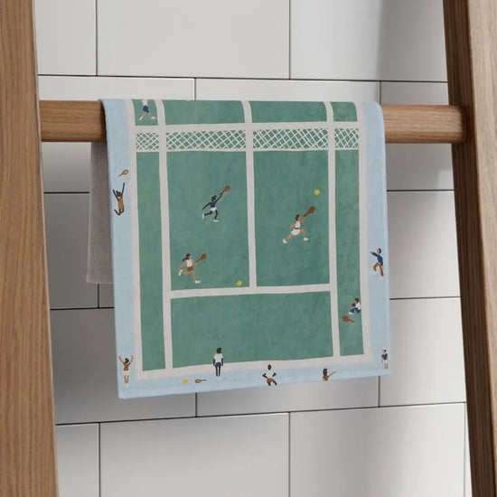 Hand towel featuring a tennis court design