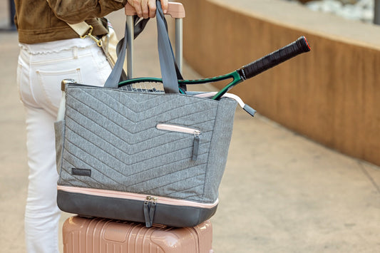 Doubletake Parisii bag on a suitcase.