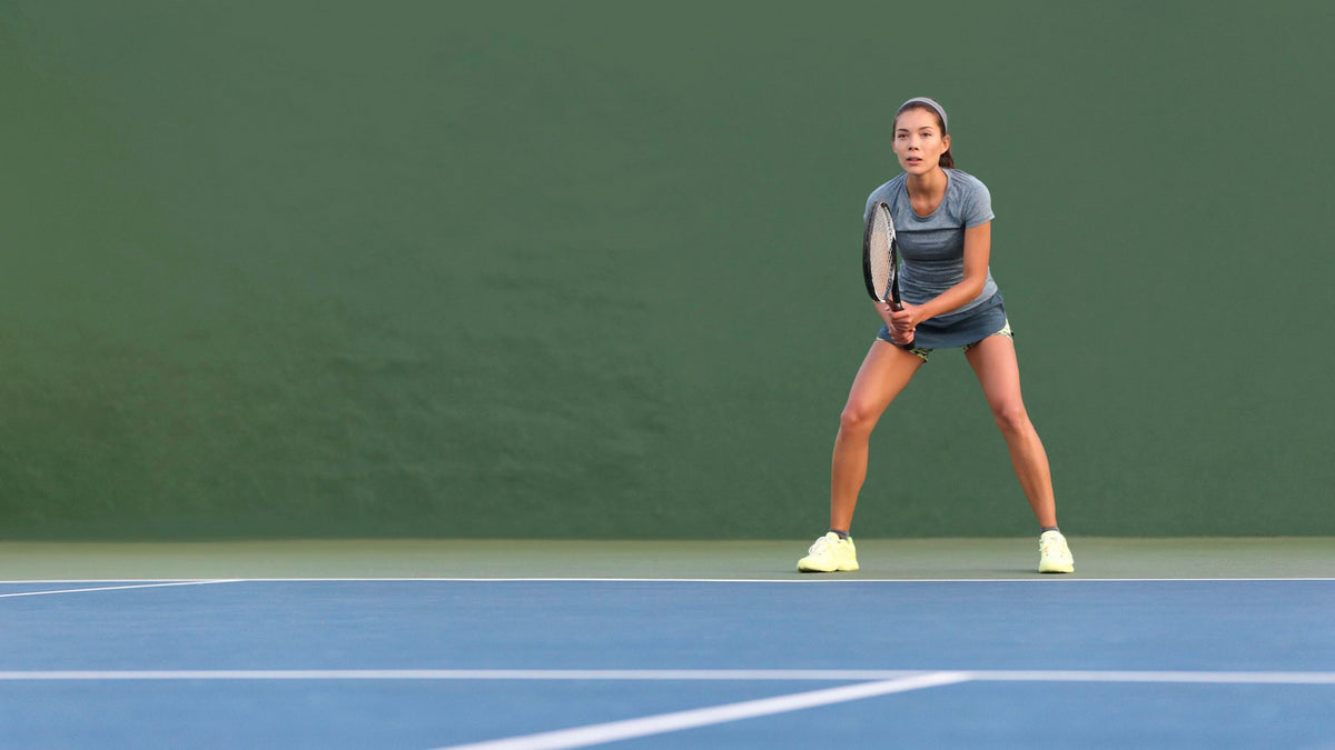 Woman ready to receive a serve