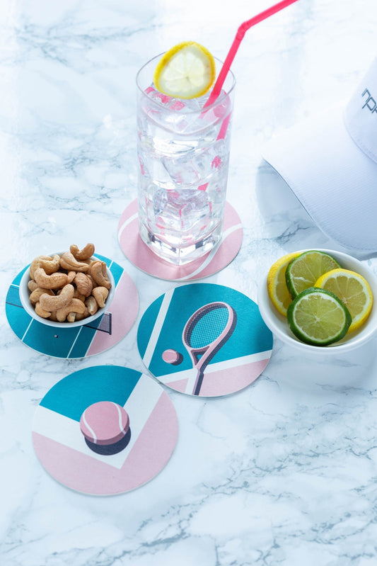 Drink and snacks on tennis themed coasters.