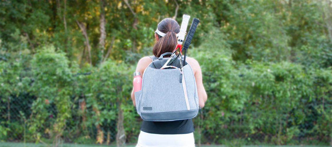 Woman wearing the Melbourne tennis bag