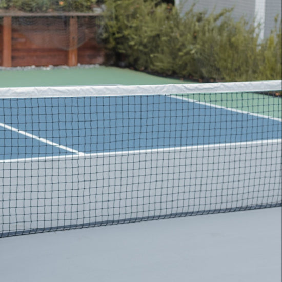 Close to the net on the pickleball court