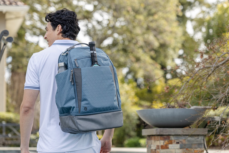 Man carrying a pickleball bag