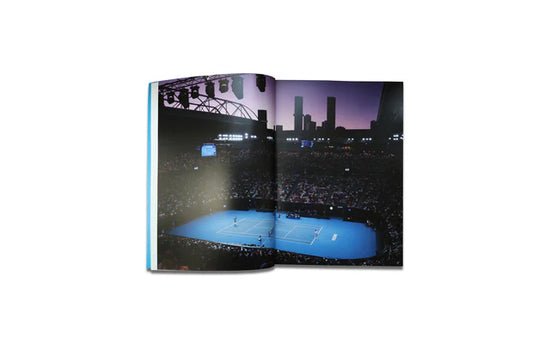 Book opened showing page with a picture of a tennis court