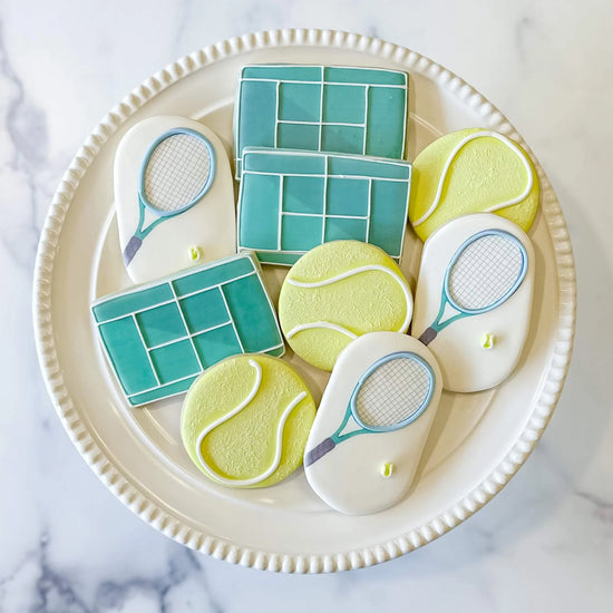 Assortment of tennis themed decorated cookies