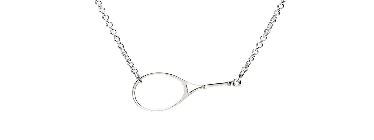 Silver necklace with a tennis racquet-shaped pendant on a delicate chain.