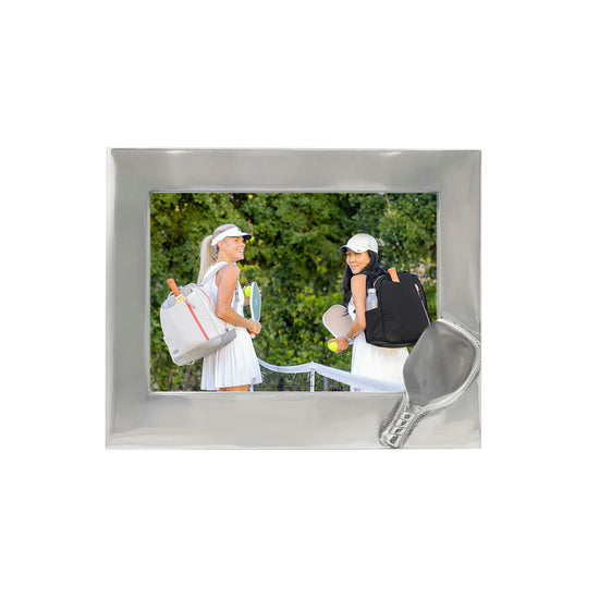 Pickleball players in frame