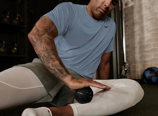 Man using the Hypersphere to massage calf. 