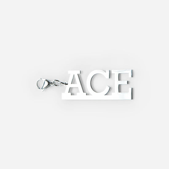 Silver keychain with the word ACE in bold capital letters on a white background.