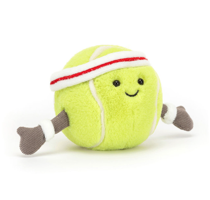 Plush tennis ball toy with a smiley face, wearing a headband and wristbands, with outstretched arms.