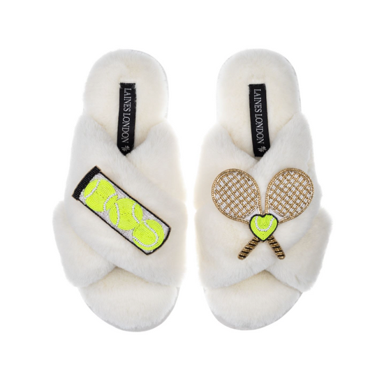 Fuzzy white slippers with tennis ball and racquet brooches