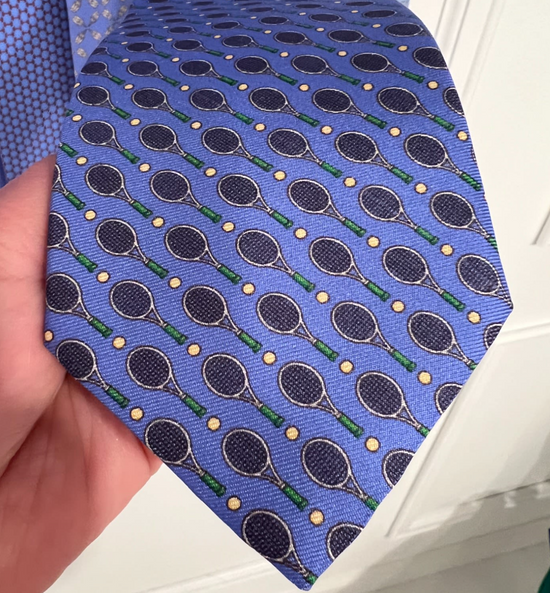 Swatch of material with Tennis racquets on it