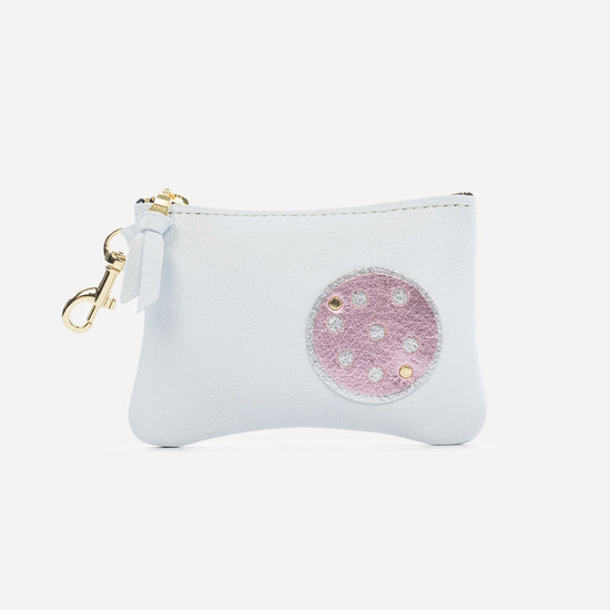 Doubletake Shay pouch in white with metallic pink pickleball detail.