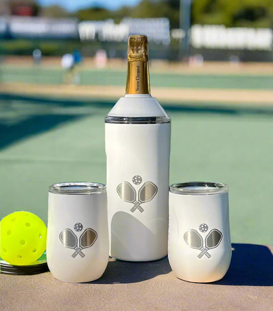 Wine glass set with pickleball paddle and ball detail.