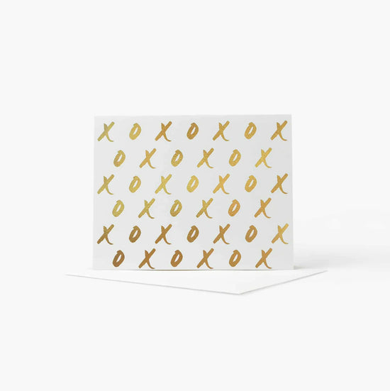 Card with X O detail in gold