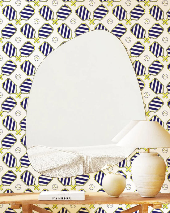 Pickleball paddle wallpaper behind a mirror.