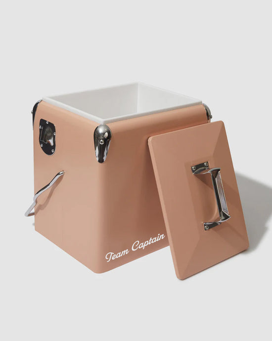 Tan cooler with Team Captain text, open lid, and chrome handles against a plain background.